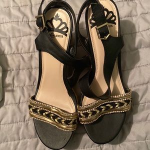- Fergalicious Black and Gold Sandals